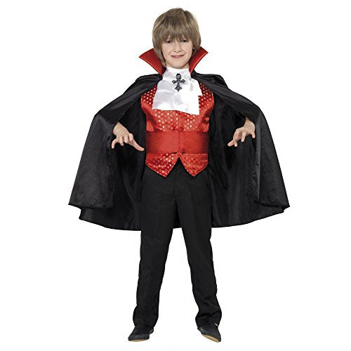 "Boy wearing a red and black vampire costume with a black cape."