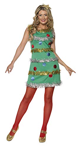 Woman wearing a green Christmas tree costume dress with ornaments and tinsel, red tights, and gold shoes.