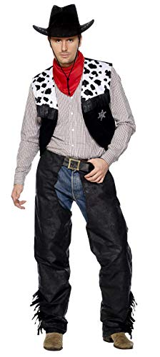 Man wearing a cowboy costume with a vest and chaps.