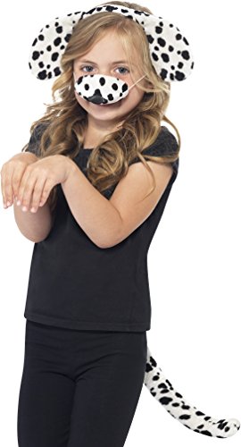 A young girl wearing a Dalmatian costume, including a headband with ears, nose mask and tail.