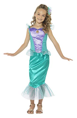 Young girl wearing a purple and teal mermaid costume with fins.