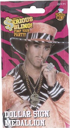 Man wearing a gold dollar sign medallion, zebra print shirt, and wide-brimmed hat.