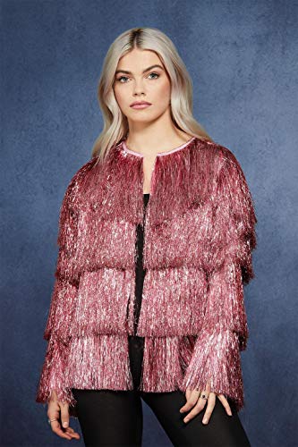 A woman wearing a layered, metallic pink tinsel fringe jacket against a blue background.