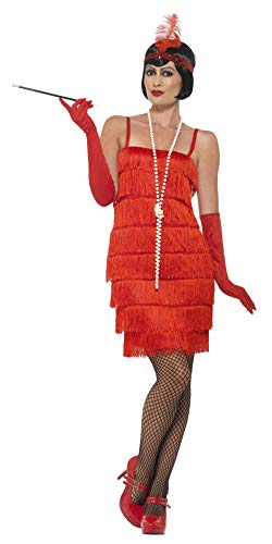Woman wearing a red, fringed 1920s flapper costume with headband.