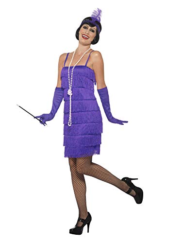 Woman wearing a purple, fringed 1920s flapper costume and headpiece.