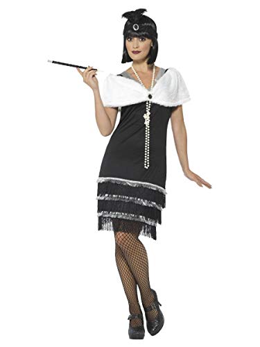 Woman in a black 1920s flapper dress with white fur stole and headband.
