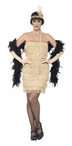 Woman wearing a gold flapper dress with fringe and feather boa.