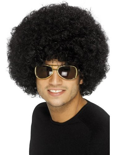 Man wearing a large, curly black afro wig and sunglasses against a white background.