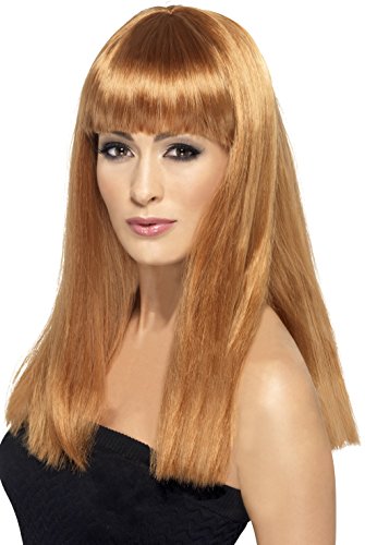 Woman wearing a long, straight auburn wig with a full fringe.