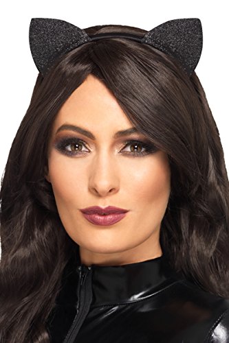 Black glitter cat ears on a headband worn by a woman.