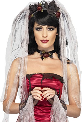 Woman wearing red gothic dress, white veil, choker, and gloves against a white background.