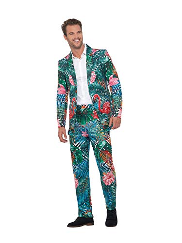 A man wearing a suit with a green tropical flamingo and hibiscus print.