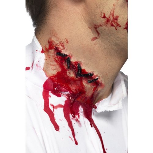 Realistic latex scar with stitched wound and dripping fake blood on neck.