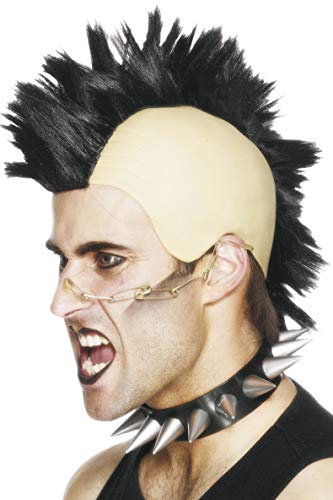 Man wearing a black mohawk wig with spiked collar and glasses.