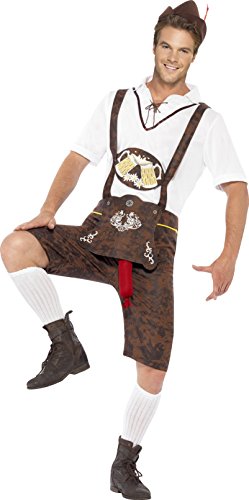 Man wearing traditional Bavarian costume: white shirt, brown lederhosen, and black boots.