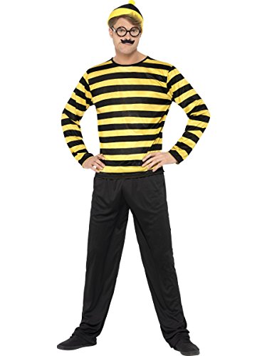 A man wears a yellow and black striped shirt, black trousers, hat, glasses, and moustache.