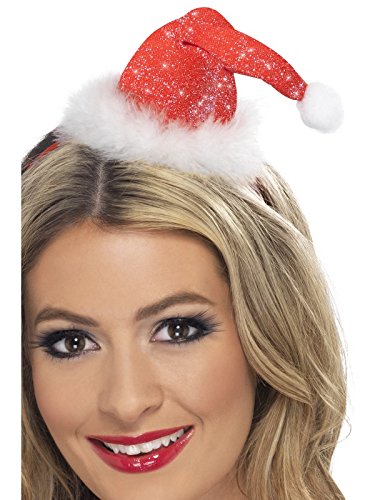 A blonde woman wearing a red glittery Santa hat with white trim.