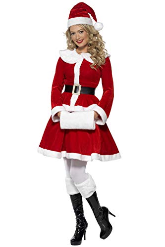 Woman wearing a red Miss Santa costume with white fur trim.