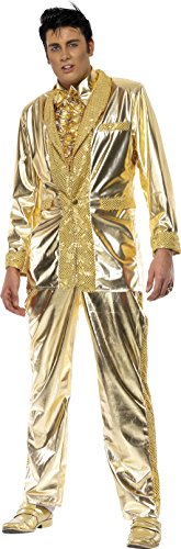 A man wearing a shiny gold Elvis Presley costume with matching pants and shoes.