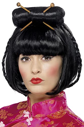 Black bob wig with bangs and hair sticks, modeled on a person.