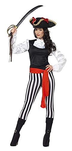 Woman in a black and white striped pirate costume holding a sword.