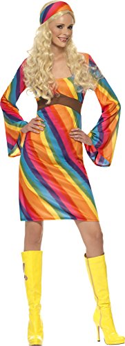Woman in a rainbow-striped dress, headband, and yellow boots.
