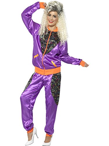 "Woman wearing shiny purple and orange tracksuit with floral pattern and white high heels."