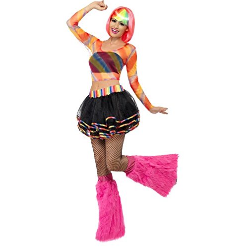Woman in colorful 80s-style wrestling costume with rainbow wig and pink boots.