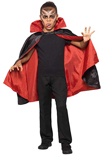 A child dressed as a vampire wearing a black and red reversible cape.