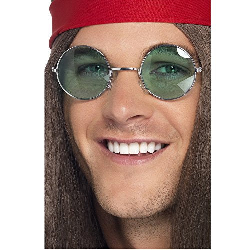 A man wearing round, green-tinted glasses and a green headband with a wig.