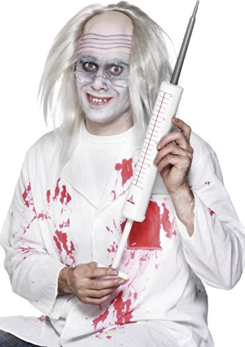 Man in a white lab coat with red splatters holding a large fake syringe.