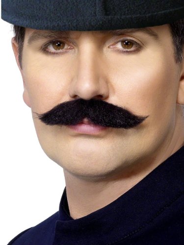 Man wearing a large, black Victorian-style mustache and cap.
