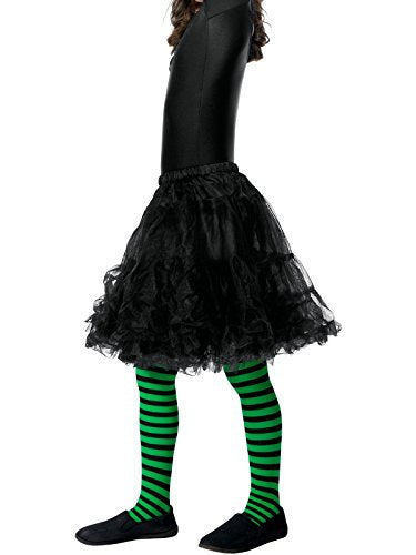 A child wearing green and black striped tights with a black skirt.