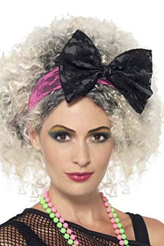 Woman wearing curly white wig and black lace headband with a large bow.