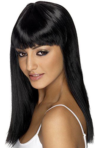 "Model wearing a long, straight black wig with bangs, white tank top, against a white background."