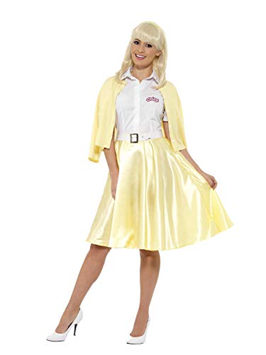Woman wearing a 1950s style yellow skirt, white shirt, and yellow cardigan costume.