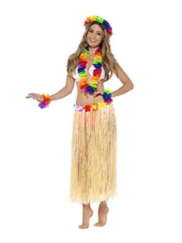 Woman modeling a rainbow Hawaiian flower lei, skirt, and wristband set.