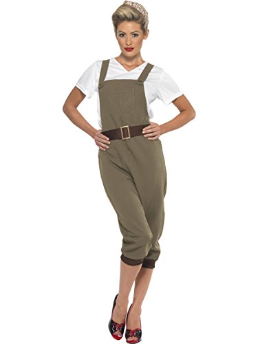 Woman in olive green overalls and headscarf, vintage workwear style.