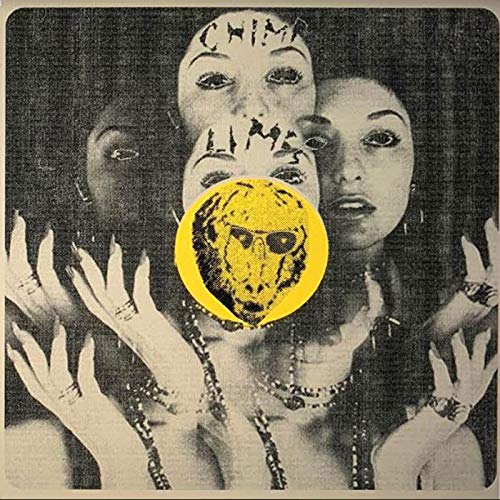 Record cover with three faces and a yellow lion image.