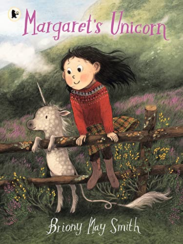 Girl and a white unicorn standing on a wooden fence.