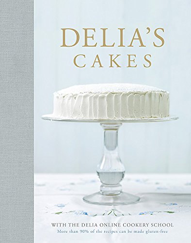 Cookbook cover featuring a frosted cake on a glass cake stand.