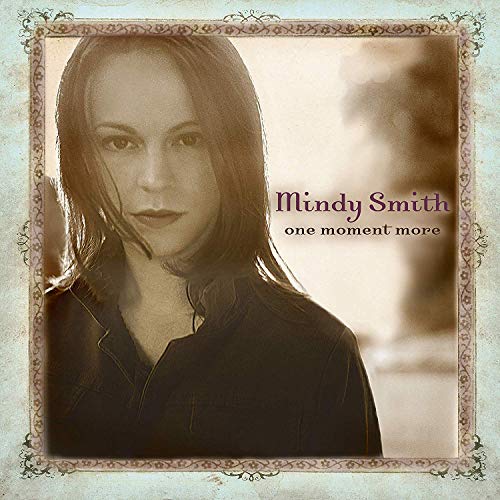 "Album cover featuring sepia-toned portrait of Mindy Smith with ornate border."