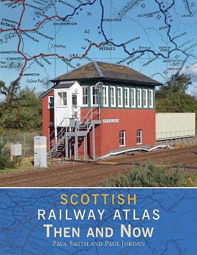 Red railway signal box with tracks, featured on a Scottish railway atlas cover.