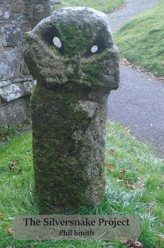 Moss-covered stone pillar with carved eye-like holes, book title below.