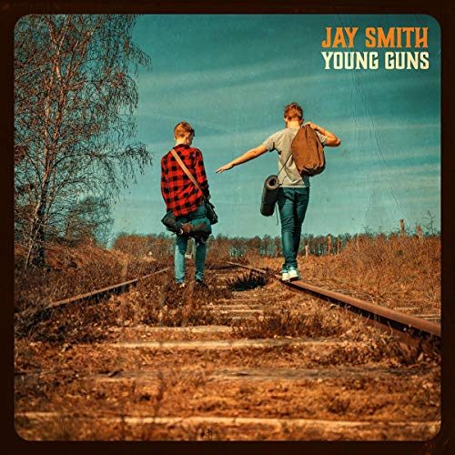 "CD cover art featuring two men walking on train tracks, carrying bags."