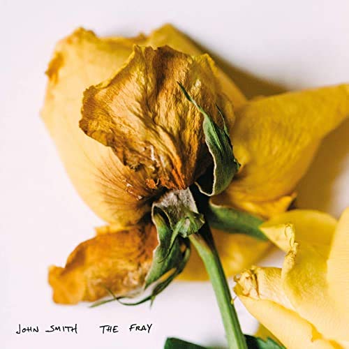 CD cover featuring a close-up of a wilting yellow rose.