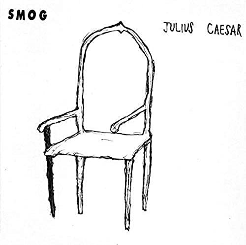 Black and white sketch of an ornate chair on a white background.