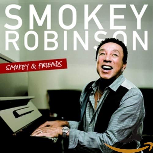 Smokey Robinson portrait on CD cover, playing piano, smiling warmly.