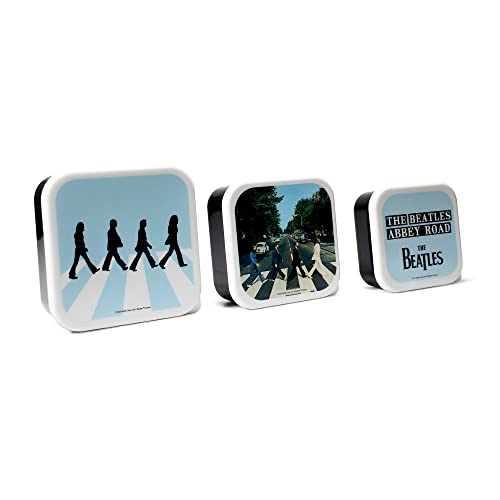 Three square metal tins featuring The Beatles’ Abbey Road album artwork.