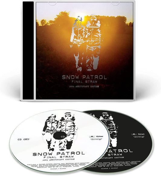 "CD case with two discs, Snow Patrol album artwork featuring silhouetted figures."